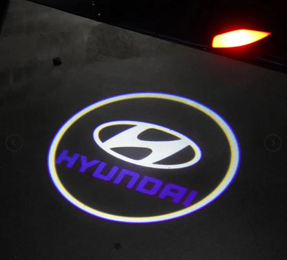 LUMIGLOW™ LUCES DE BIENVENIDA CON EL LOGO + ENVIÓ GRATIS (2 PIEZAS)