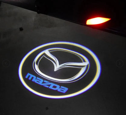 LUMIGLOW™ LUCES DE BIENVENIDA CON EL LOGO + ENVIÓ GRATIS (2 PIEZAS)