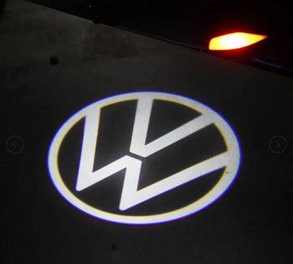 LUMIGLOW™ LUCES DE BIENVENIDA CON EL LOGO + ENVIÓ GRATIS (2 PIEZAS)